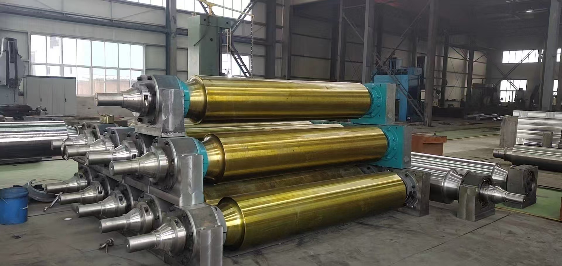 কোন অ্যাপ্লিকেশনগুলিতে স্লাইডিং রোলার পরিবাহক উপাদানগুলি প্রাথমিকভাবে ব্যবহৃত হয়?